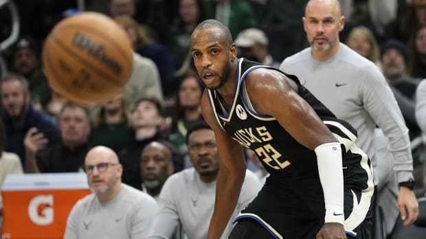 Milwaukee Bucks forward Khris Middleton (22) looks at the ball during the second quarter against the Cleveland Cavaliers at Fiserv Forum.